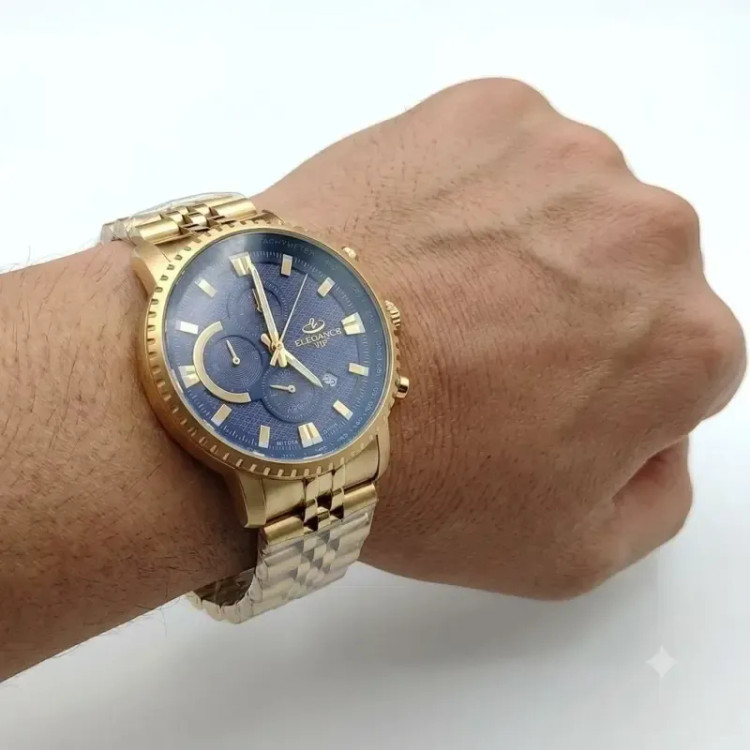 ساعت مچی مردانه الگانس طلایی صفحه سرمه ای سه موتور کرنوگراف